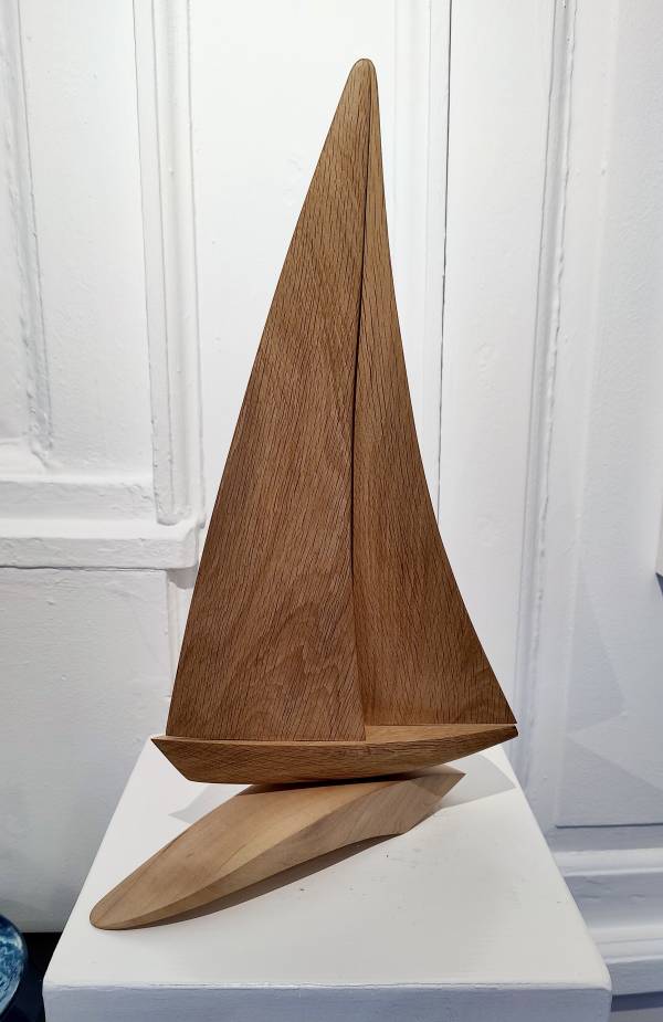 - a , wood Sculpture by Kevin Longstaff, measuring 49 x 31 cm (H x W) £175